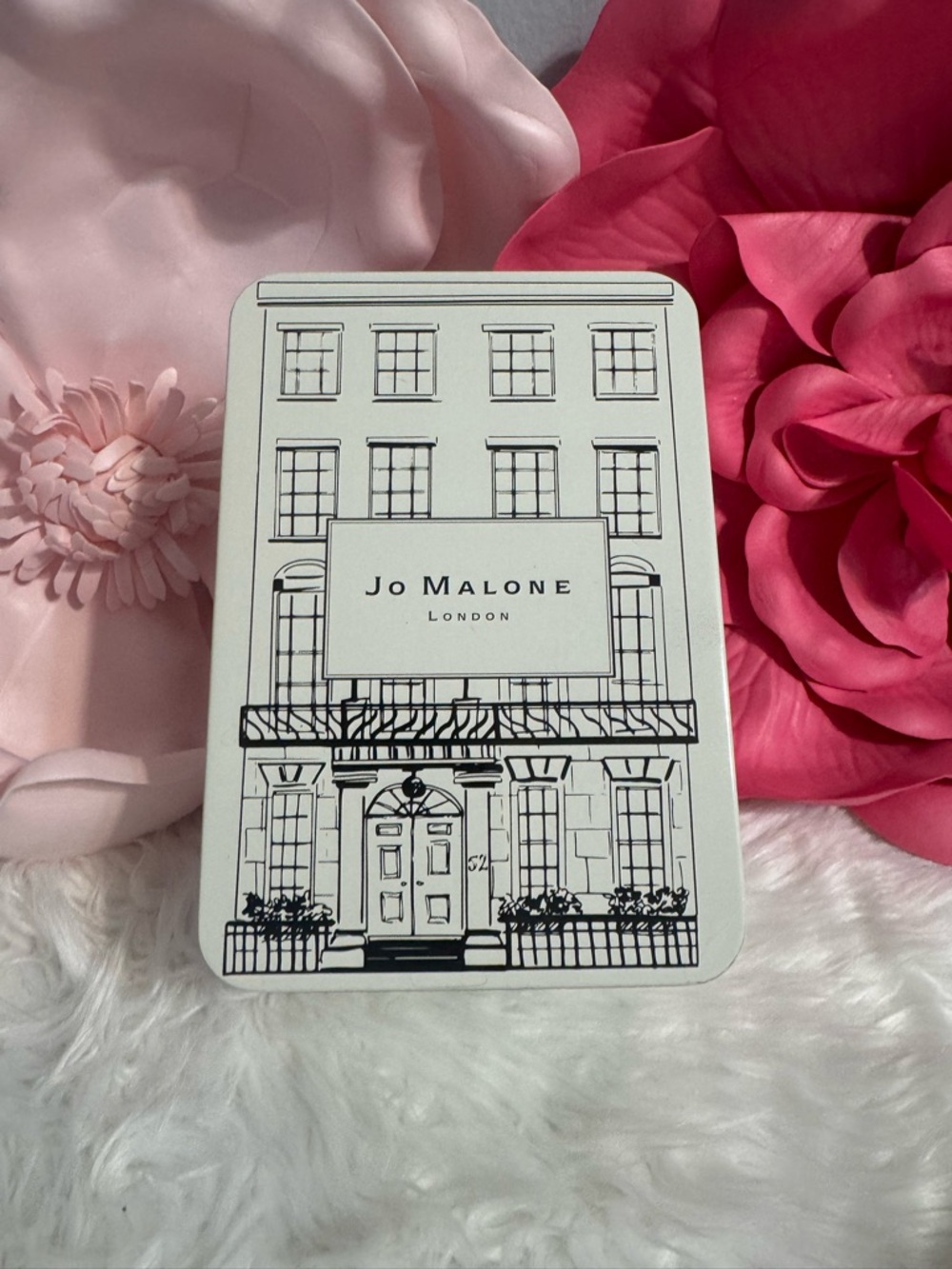 JML Limited Edition Keepsake Tin, featuring the iconic "Townhouse" illustration.